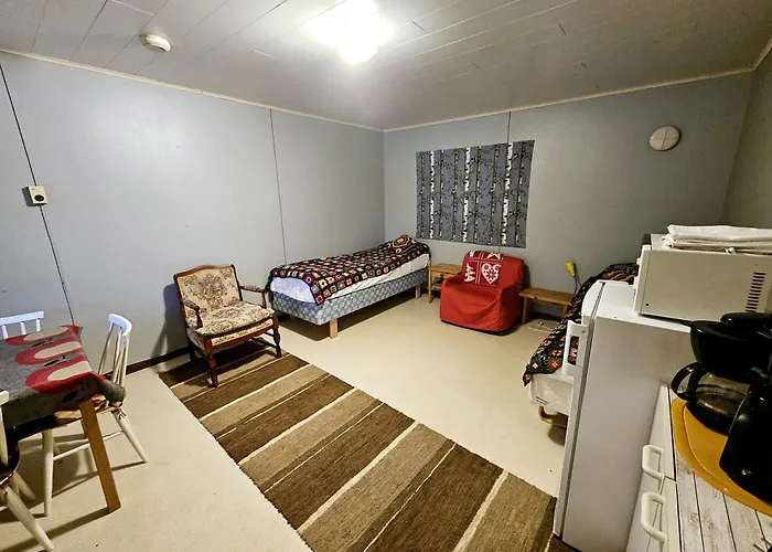 Lomakylae Lapponia Деревянный коттедж Инари